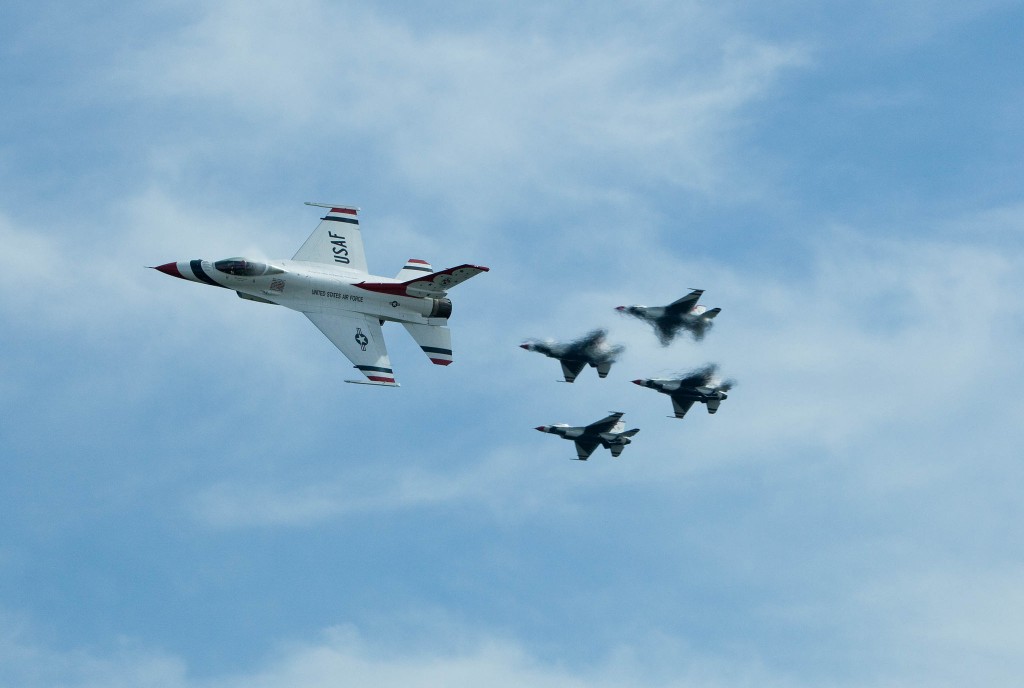 Four jets in formation following a leader