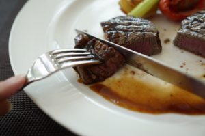 a steak being cut