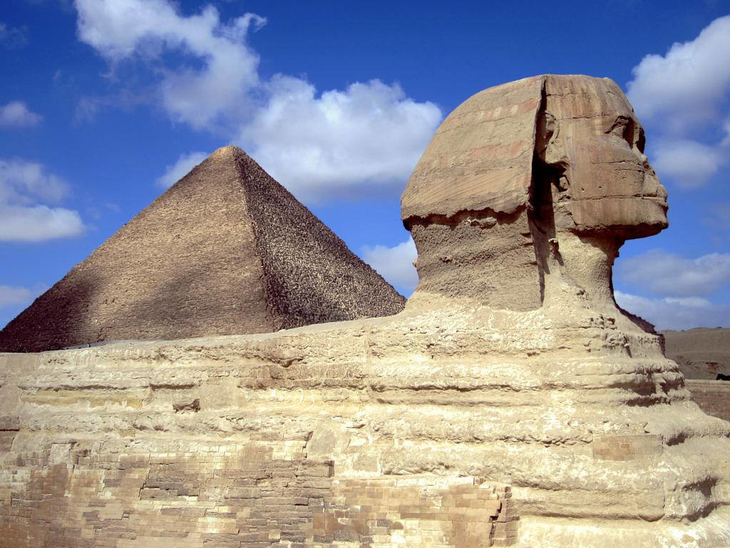The Sphinx and the Great Pyramid of Khufu in Cairo, Egypt
