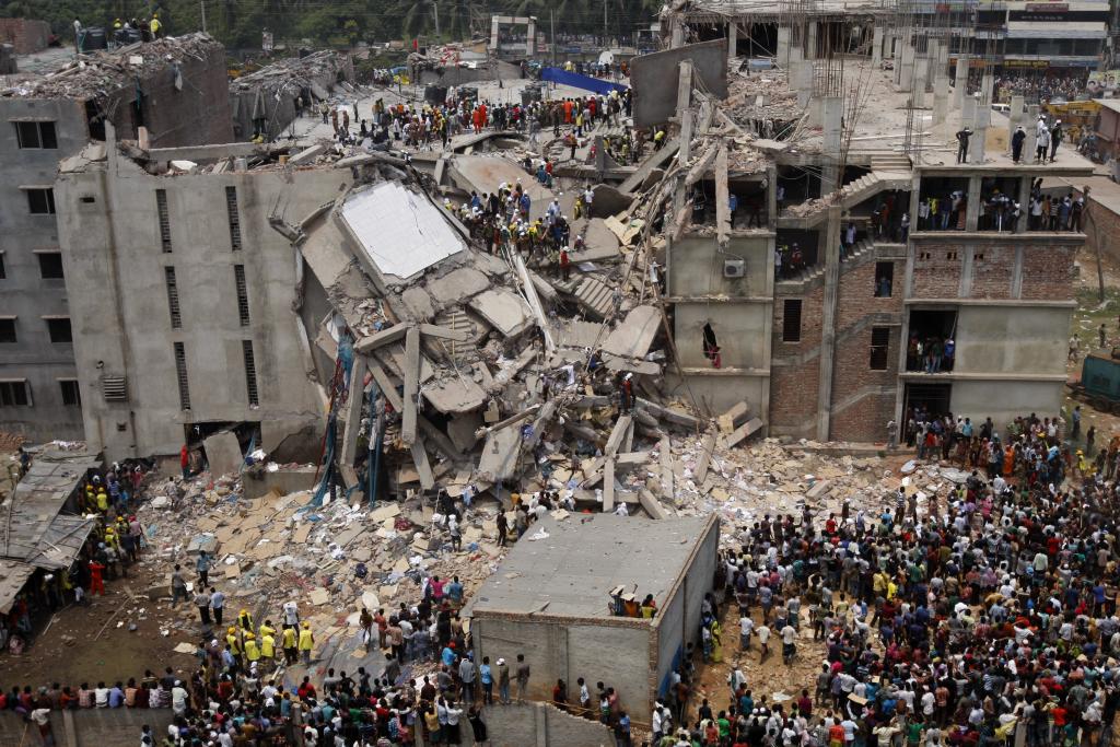 the aftermath of a collapsed factory building, Rana Plaza, Bangladesh