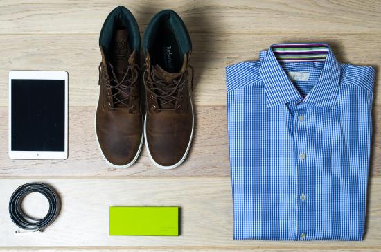 a pair of men's shoes, shirt, and an iPad