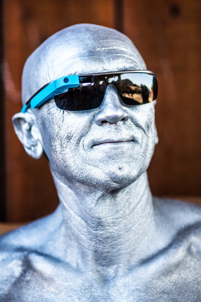 A man wears a pair of Google Glass glasses