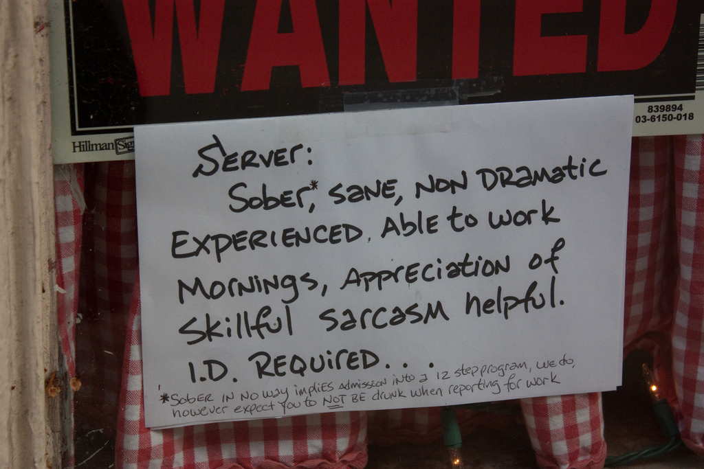 Help Wanted sign that reads, "Wanted: Server: Sober, sane, non-dramatic, experienced, able to work mornings, appreciation of skillful sarcasm helpful. ID required."