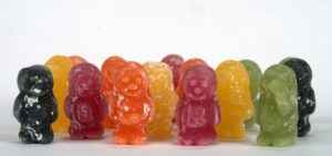 Multi-colored jelly candy in the shape of people.