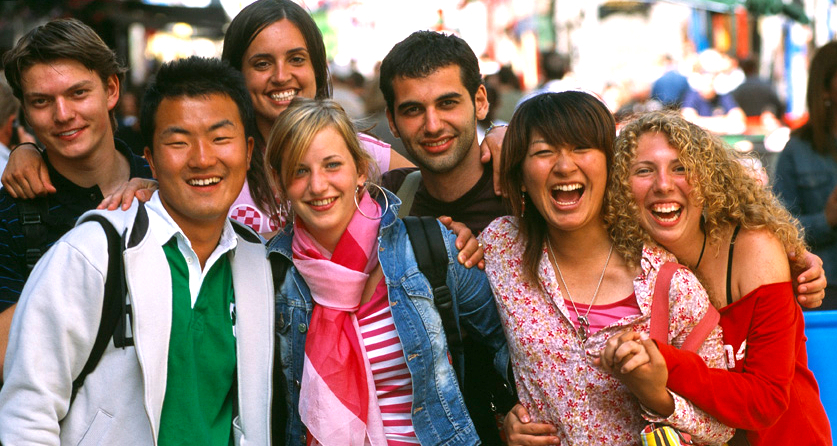 Group of seven people from different cultural backgrounds.