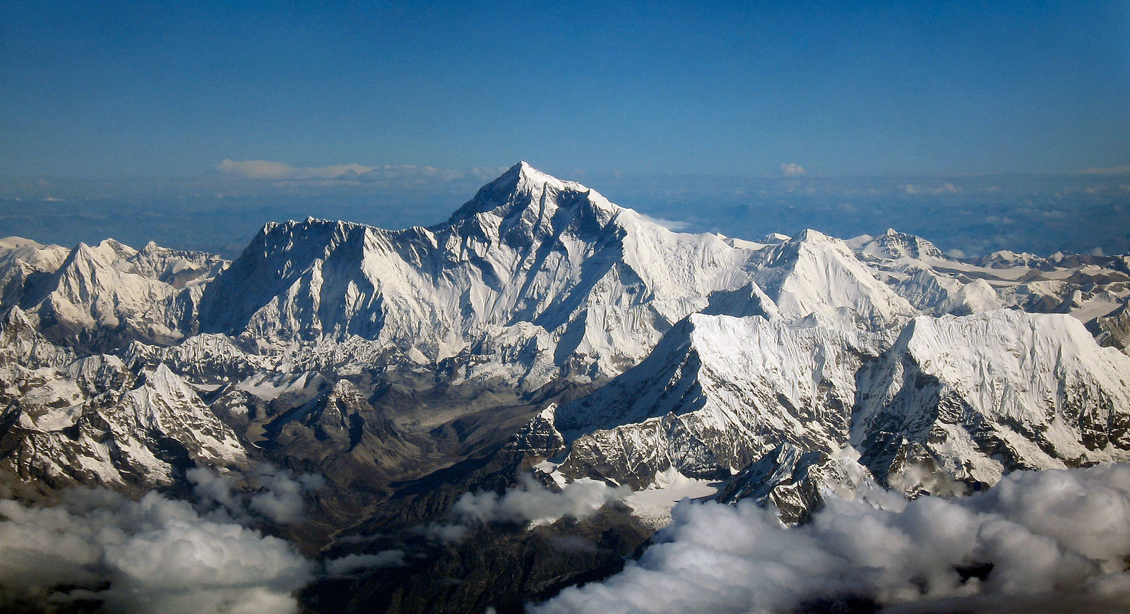 A photograph of Mount Everest; the mountain is covered in snow and imposing.