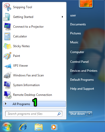 Windows 7 start menu. A green one is displayed over the "all programs" option.