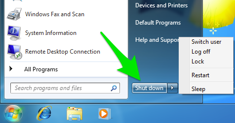 Start menu with green arrow pointing at the shut down button on Windows 7.