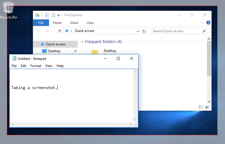 A snipping tool is in use taking a screenshot of a file folder and an opened windows text box.