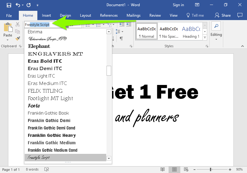 There is a Microsoft Word document open with two lines of text on it. A green arrow is pointing to the font formatting section which is found in the home tab on the ribbon menu. This arrow is pointing to the option to change the font style. The font style has been manually entered to "Freestyle Script".