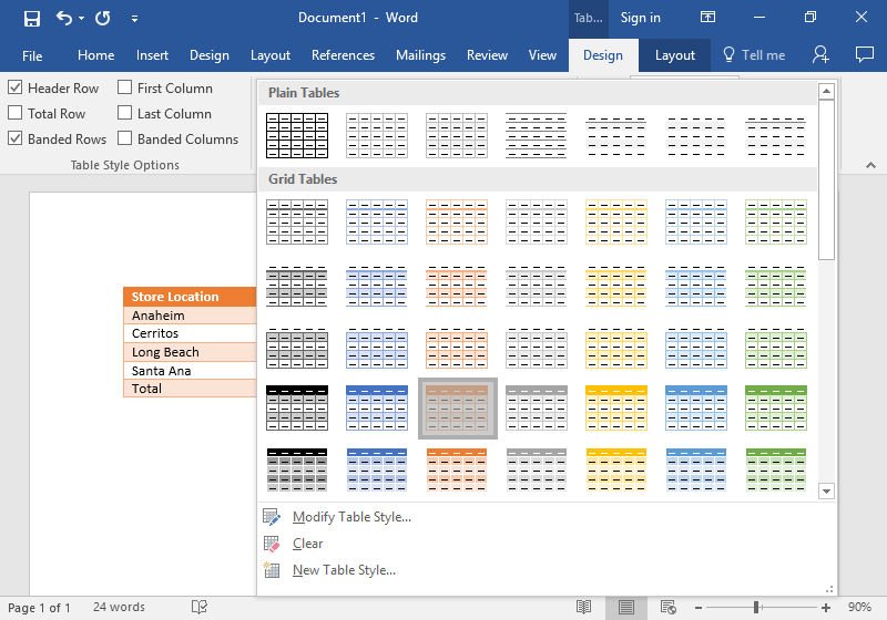 A Microsoft Word document is open with a table on it. The table has five different rows and two individual columns. The option to change the table to an orange grid table has been selected.