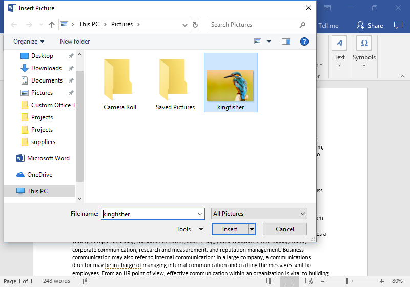 A microsoft word document in the background with text is open. In front of the document a file finder has been opened allowing you to search for images on this pc. In the file name box "kingfisher" has been entered.
