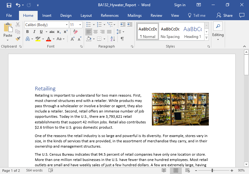 A Microsoft word document with text on it. An image of a golden shopping cart is stationary in front of the frozen foods aisle at a grocery store. The shopping cart is empty. The image has been aligned to the right and has been formatted to fit into the text.