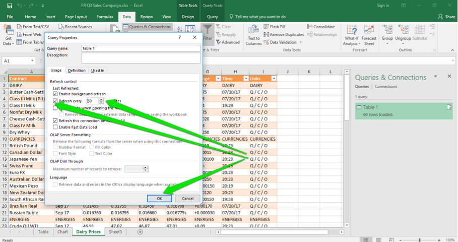 An excel sheet is open with the newly loaded data table inserted. The query properties dialog box is open and there are three green arrows displayed. The first one points at the option to set a time to refresh the table, the second one shows that the time has been set to 60 minutes and the third arrow shows that the ok button has been selected.