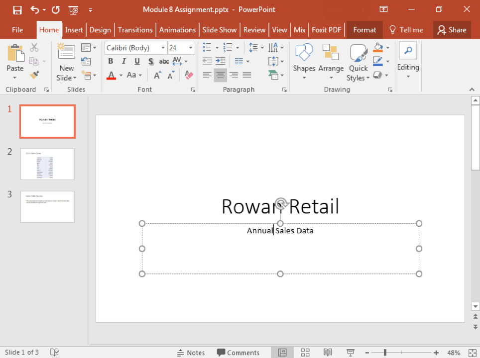 A Microsoft Powerpoint deck is open with 3 slides created. It is open to the first slide in the deck and there is a text box where "Annual Sales Data" has been typed.