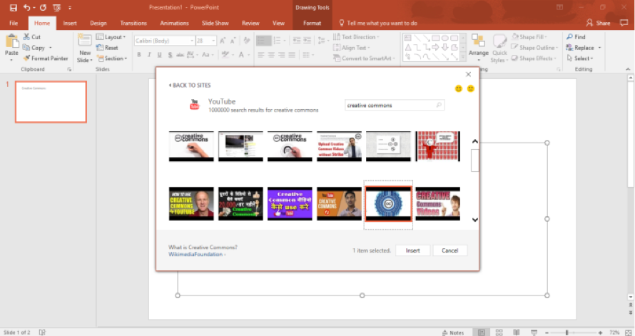 A Microsoft powerpoint is open. In the insert video dialog box results for creative commons videos are being displayed.