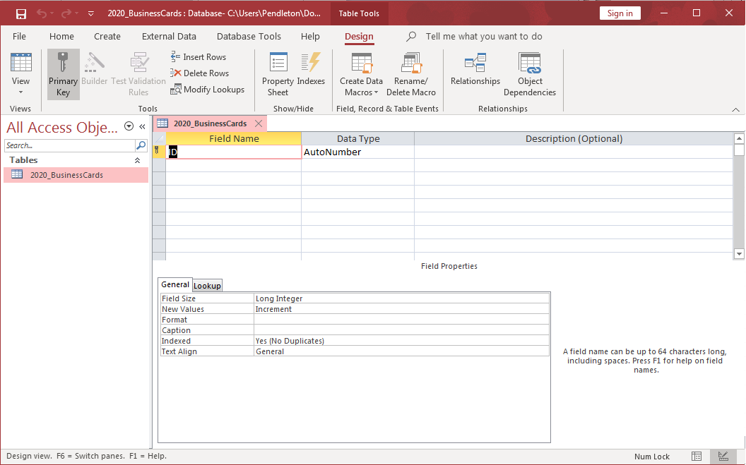 A database in Microsoft Access. A cell underneath the column "Field Name" is selected. There is a small key icon to the left of the selected cell. A dialogue box with two tabs "General" and "Lookup" is open at the bottom of the page. The tab "General" is selected with the following fields: Field Size, New Values, Format, Caption, Indexed, Text Align.