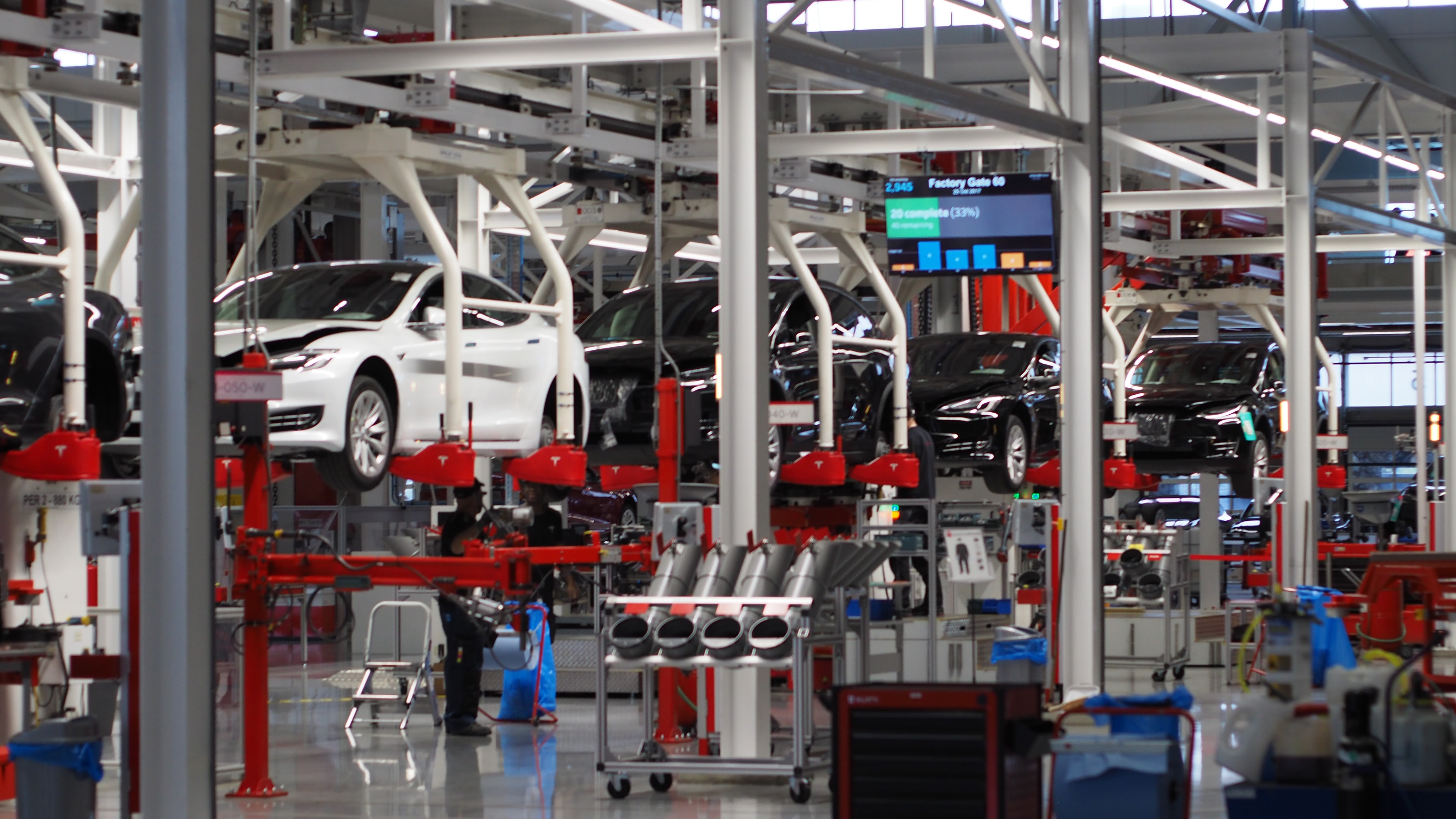 Cars in a production facility.