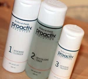 Picture of three bottles of personal cosmetic beauty products