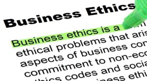 Portion of the definition of business ethics with someone beginning to highlight text in green