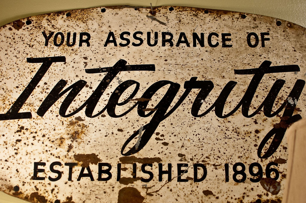 A sign that reads "Your Assurance of Integrity. Established 1896."