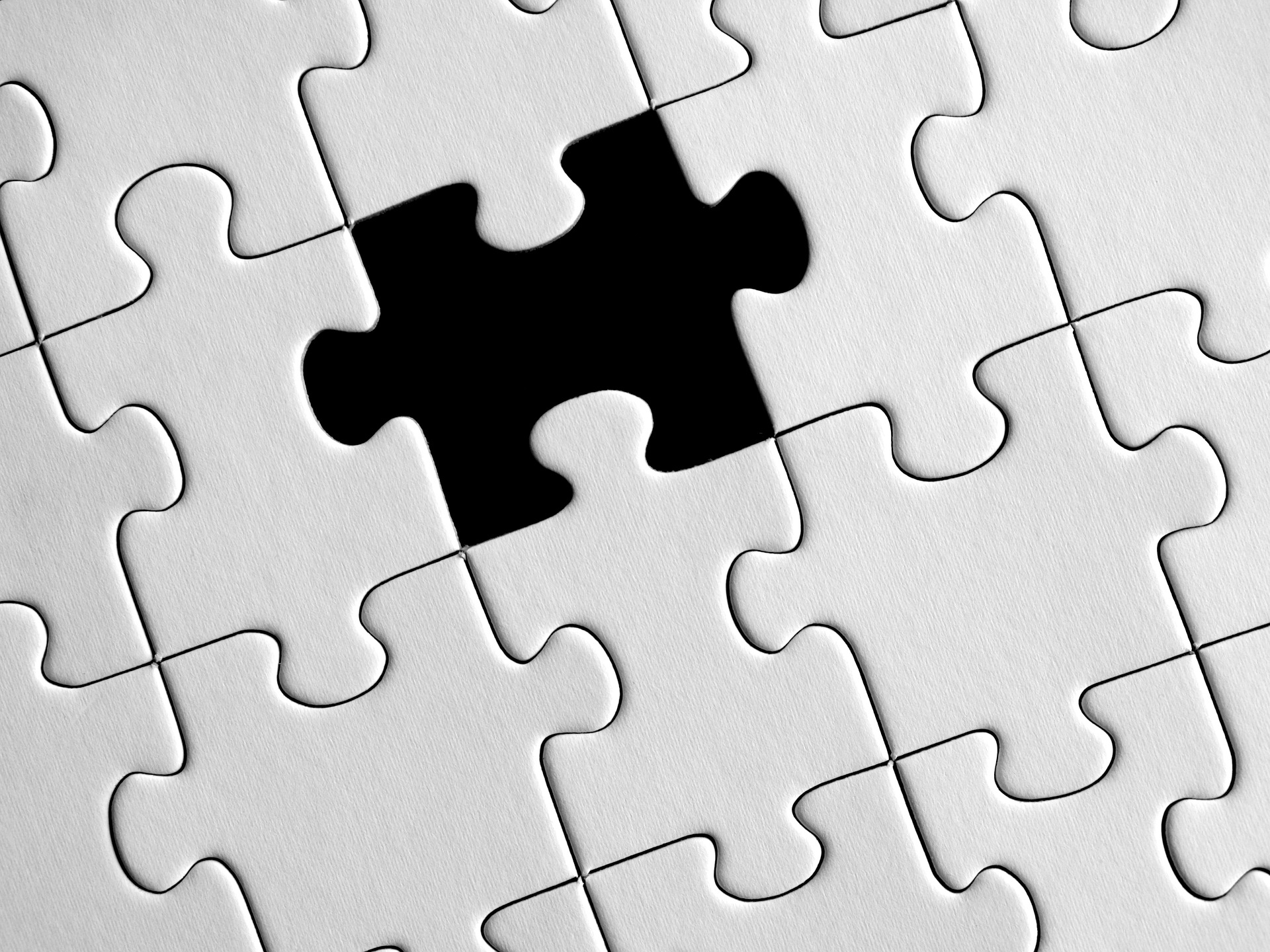 a puzzle with a missing piece