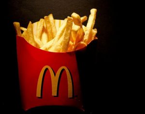 Mcdonald's french fries with a black background.