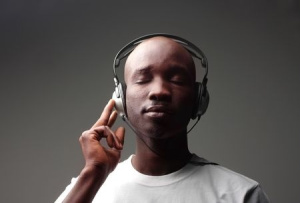 Photo of a man listening to music