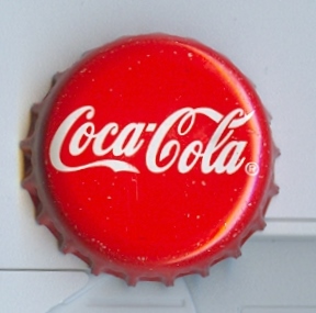 Bottle cap showing the Coca-Cola logo