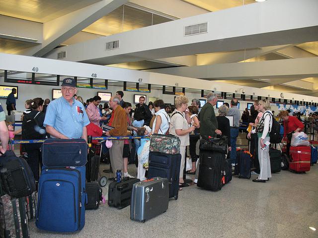 people in a long line at the airport
