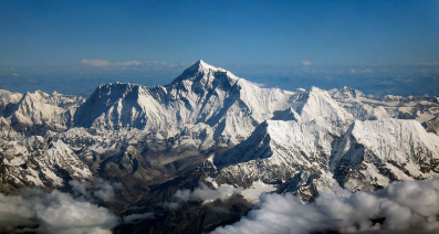A photograph of Mount Everest; the mountain is covered in snow and imposing.
