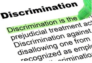 Dictionary entry for of discrimination. Definition is "Discrimination is the unjust or prejudicial treatment of different categories of people." Green highlighter is marking the definition.