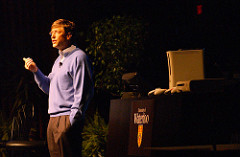 Photo of Bill Gates speaking at a school.