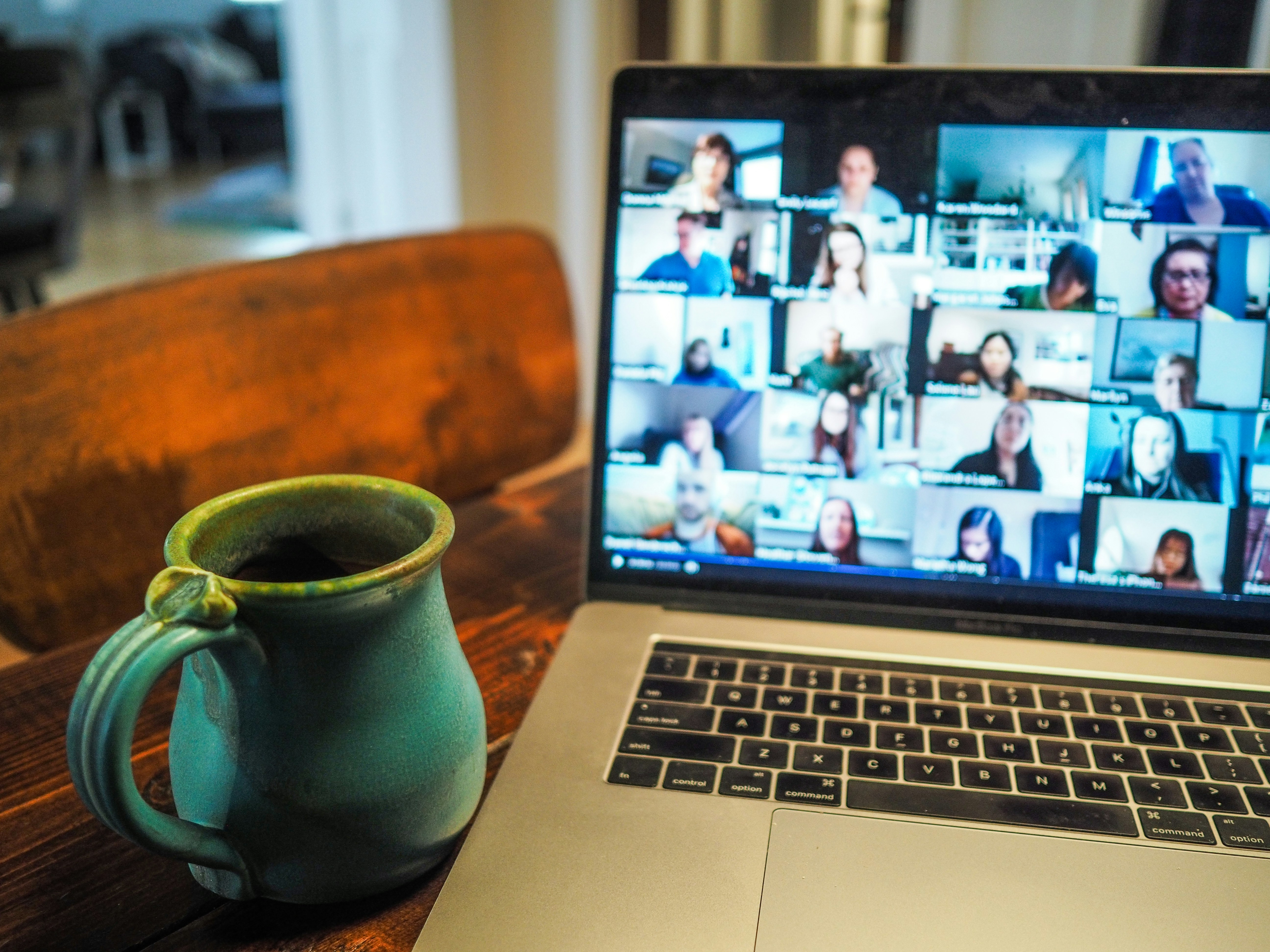 Laptop displaying a video conference panel