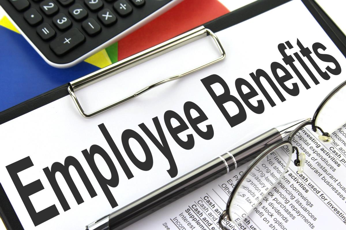 Sign on a desk saying employee benefits