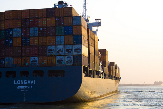 A large cargo ship transporting many goods