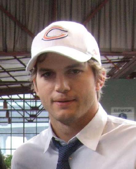 A headshot of Ashton Kutcher