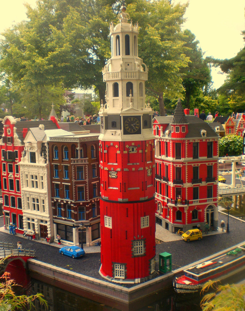 A city block with tall buildings made of legos.